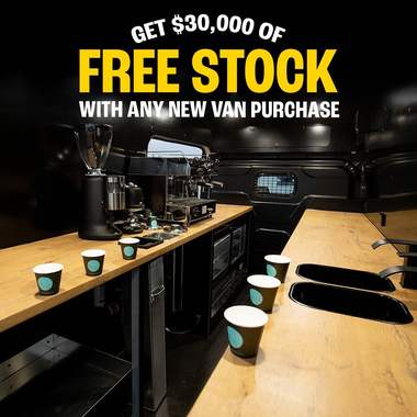 Cups, syrups and supplies laid out along a timber bench, headed “Get $30,000 of free stock with any new van purchase”.
