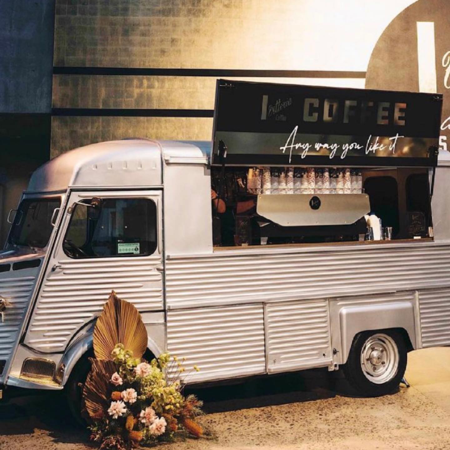 Restored Citroen HY coffee van, servery open, floral styling