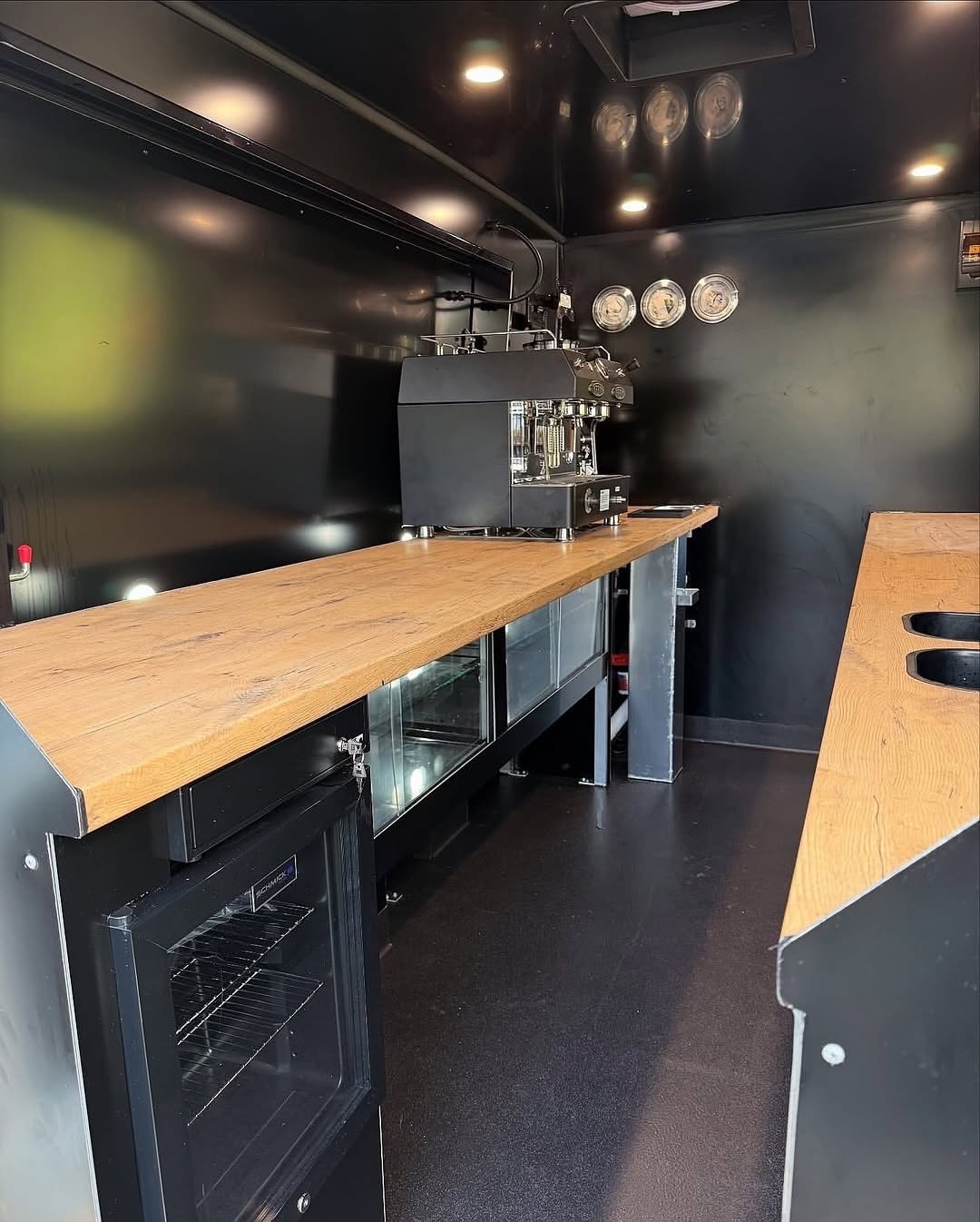 Timber bench with black espresso machine