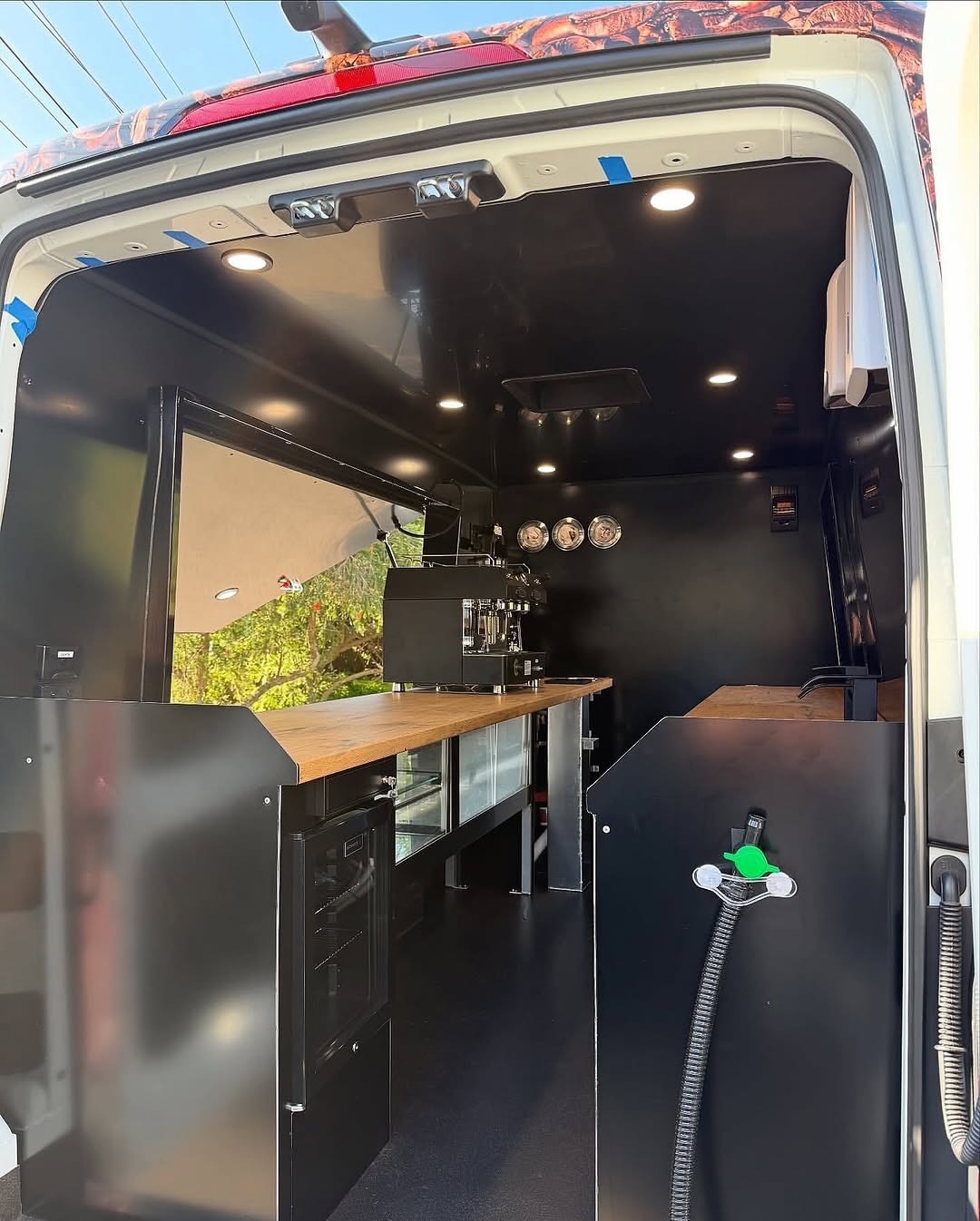 Rear doors open, fit-out partway through