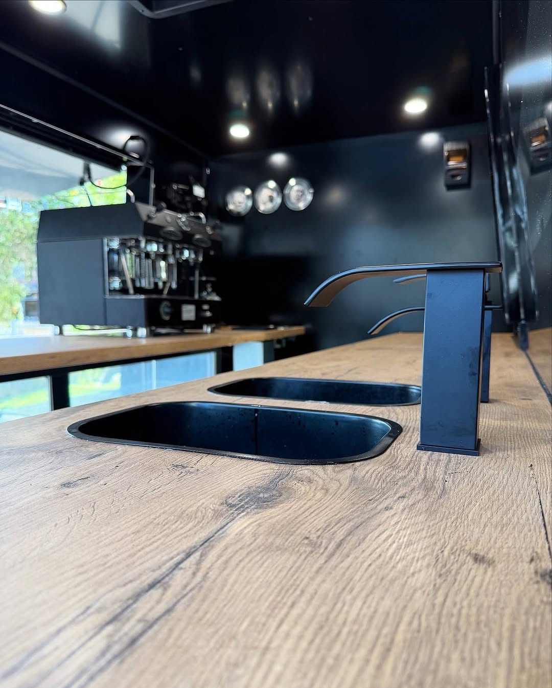 Dual sink and tap detail on timber bench